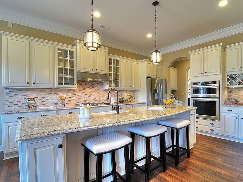 Bonterra Builders for a Traditional Kitchen with a Island and Interiors by Bonterra Builders