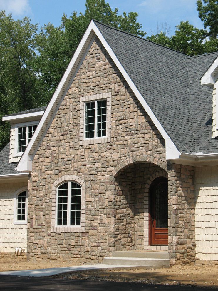 Boral Cultured Stone for a Traditional Exterior with a Archway and Boral Cultured Stone   Cobblefield by Brighton Stone & Fireplace, Inc.