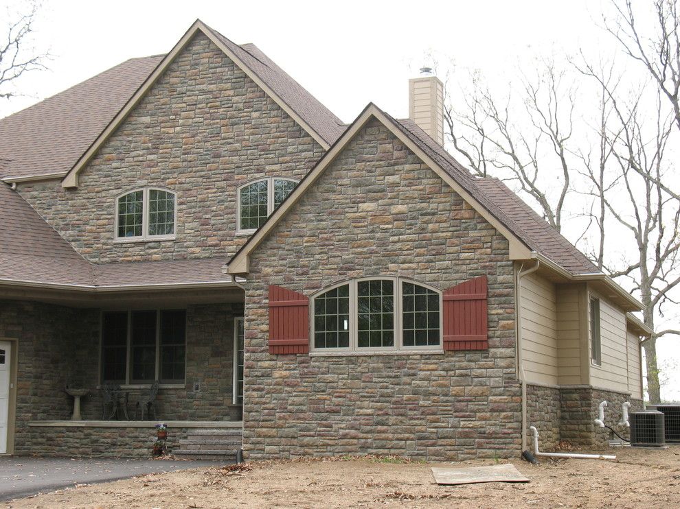 Boral Cultured Stone for a Traditional Exterior with a Stone Veneer and Boral Cultured Stone   Limestone by Brighton Stone & Fireplace, Inc.