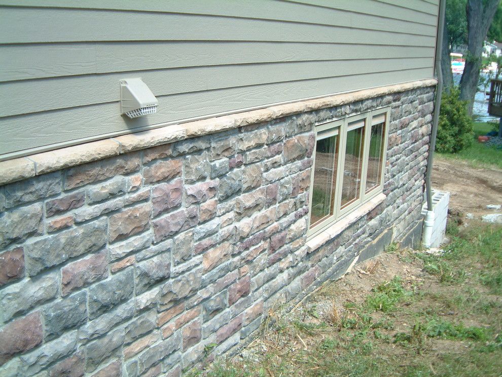 Boral Cultured Stone for a Traditional Exterior with a Thin Veneer and Boral Cultured Stone   Limestone by Brighton Stone & Fireplace, Inc.