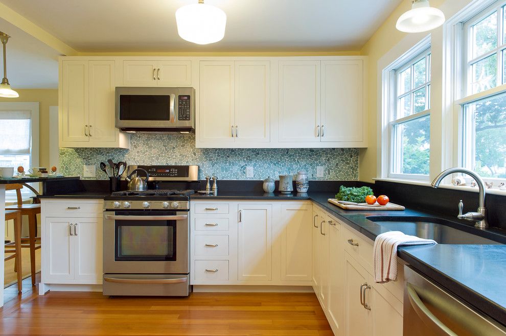 Boston Granite Exchange for a Beach Style Kitchen with a Honed Absolute Black Granite Countertop and Cape Cod Beach House Remodel by Hammond Design