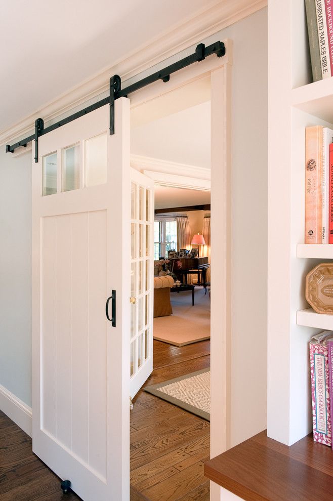 Boston Points of Interest for a Traditional Kitchen with a Barn Door and Kitchen by Su Casa Designs