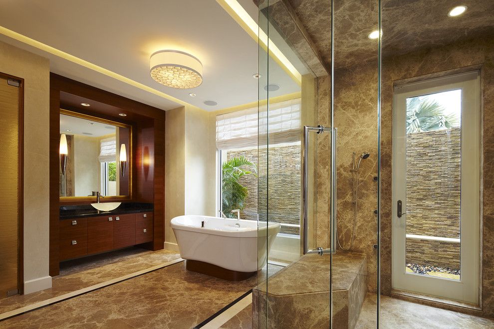 Boyd Lighting for a Contemporary Bathroom with a Freestanding Bathtub and Arnold Schulman by Arnold Schulman Design Group