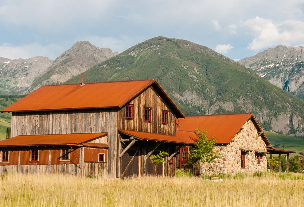 Bridger Steel for a Rustic Exterior with a Metal Roof and Rusted Steel by Bridger Steel, Inc