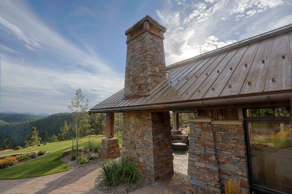 Bridger Steel for a Rustic Exterior with a Steel Roof and Rusted Steel by Bridger Steel, Inc