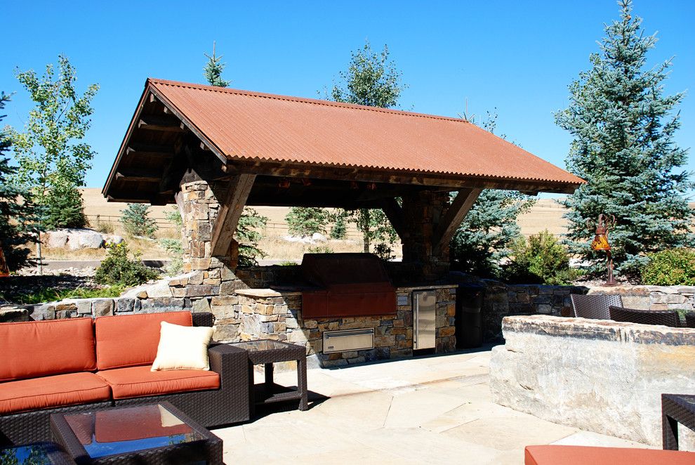 Bridger Steel for a Rustic Patio with a Corrugated and Rusted Steel by Bridger Steel, Inc