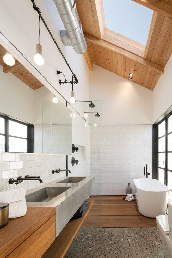 Brizo for a Industrial Bathroom with a Subway Tiles and Az Bungalow Modernized by Jc11221