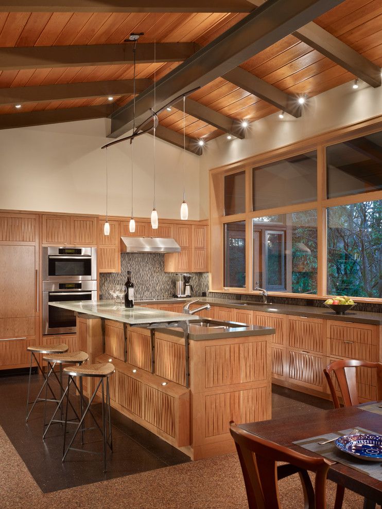 Bruck Lighting for a Midcentury Kitchen with a Metal Beam and Lake Forest Park Renovation by Finne Architects