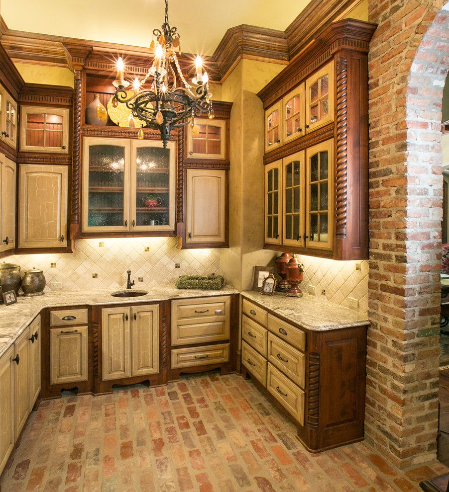 Builders Supply Outlet for a Mediterranean Kitchen with a Cornice and Butler's Pantry by Terry M. Elston, Builder