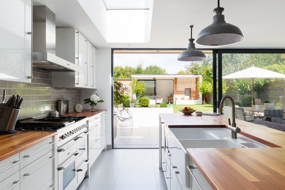 Builders Warehouse Okc for a Contemporary Kitchen with a Gray Subway Tile Backsplash and Contemporary Kitchen by Granit Chartered Architects