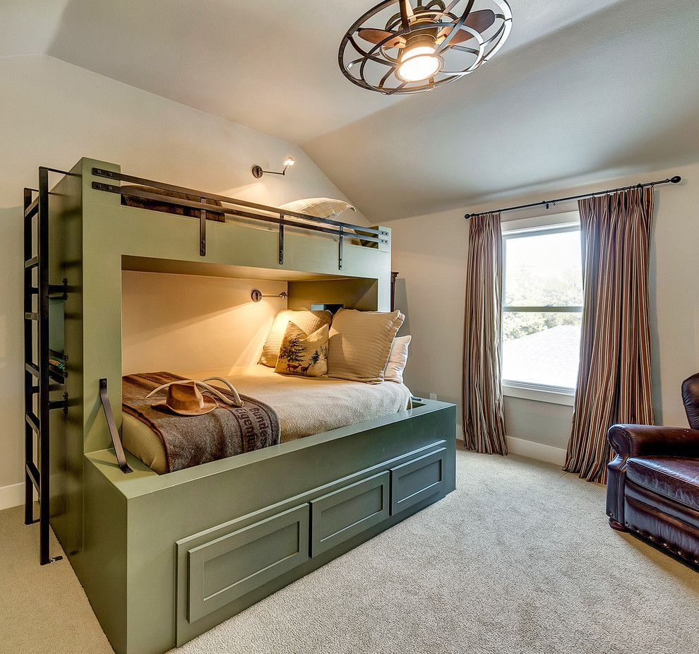 Built In Bunk Beds For A Farmhouse Bedroom With A Ceiling Fan And