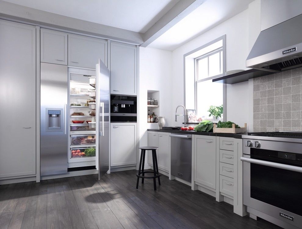 Bungalow5 for a Modern Kitchen with a Dark Wood Flooring and Miele by Miele Appliance Inc