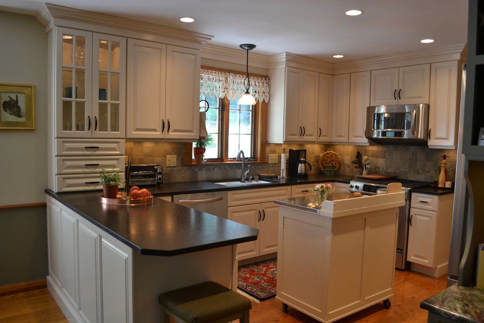 Cabico Cabinets for a Traditional Kitchen with a Tile Backsplash and Camelot Drive Kitchen, Bedford by Granite State Cabinetry