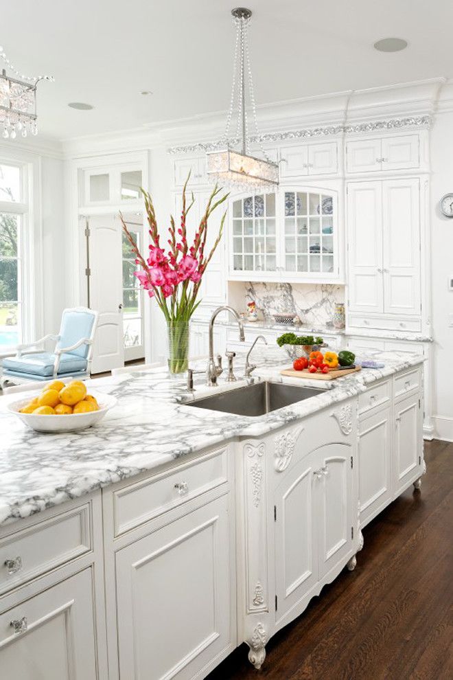 Cabinet Knob Placement for a Traditional Kitchen with a Chandelier and French Vanilla by Bradford Design Llc