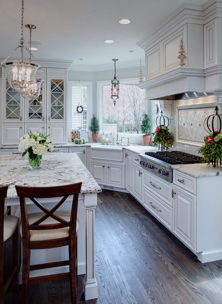 Cabinet Knob Placement for a Traditional Kitchen with a White Cabinets and Well Dressed Traditional Kitchen by Drury Design