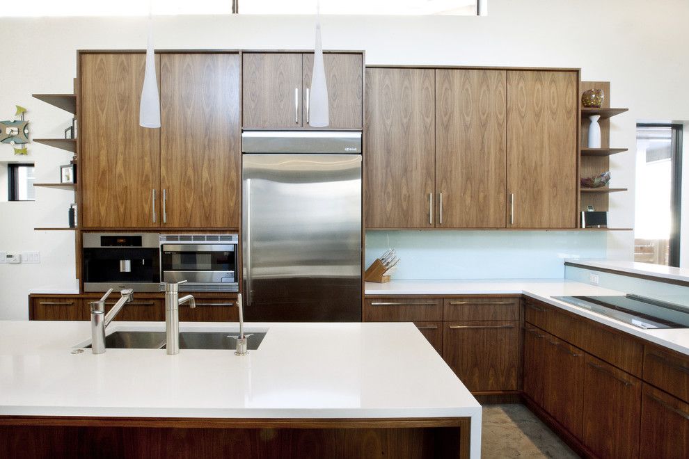 Caesarstone for a Modern Kitchen with a Waterfall Counters and Walnut and White Kitchen by Design Platform