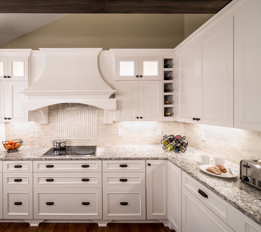 Cambria Countertops for a Transitional Kitchen with a Beige Tile Backsplash and Reclaimed Wine Barrel Lights by Sicora Design/build