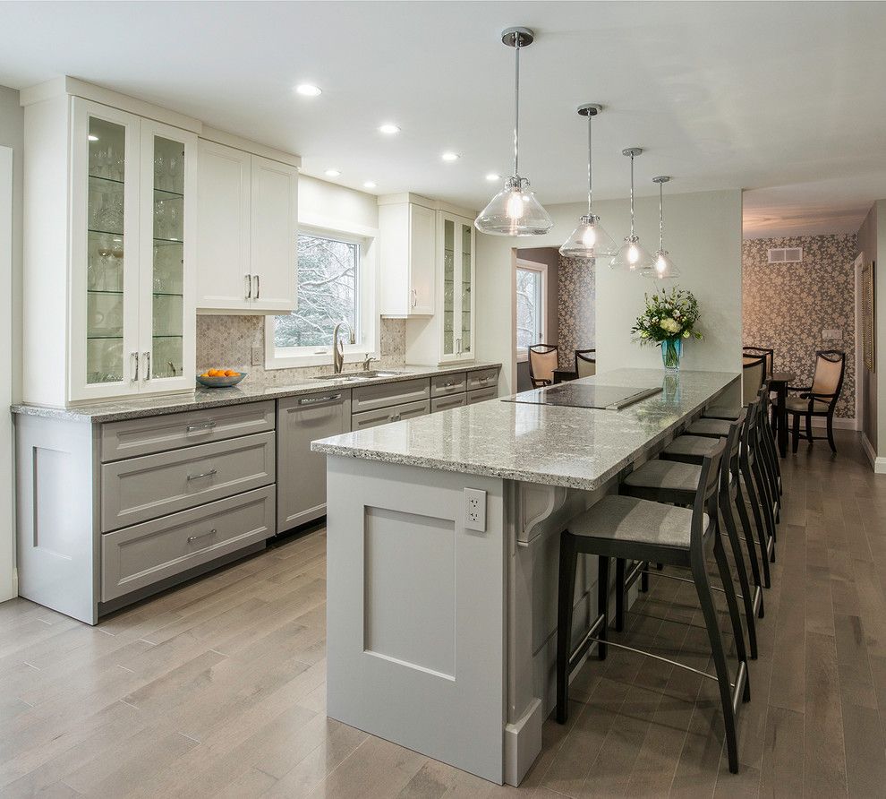 Cambria Countertops for a Transitional Kitchen with a Recessed Lighting and View of Peninsula by Tobi Brockway Interiors Inc.