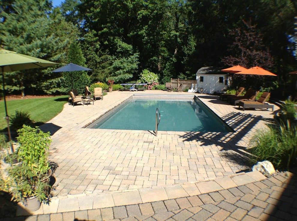 Cambridge Pavers for a Contemporary Patio with a Vinyl Pool and Cambridge Pavers by Deck and Patio Company 