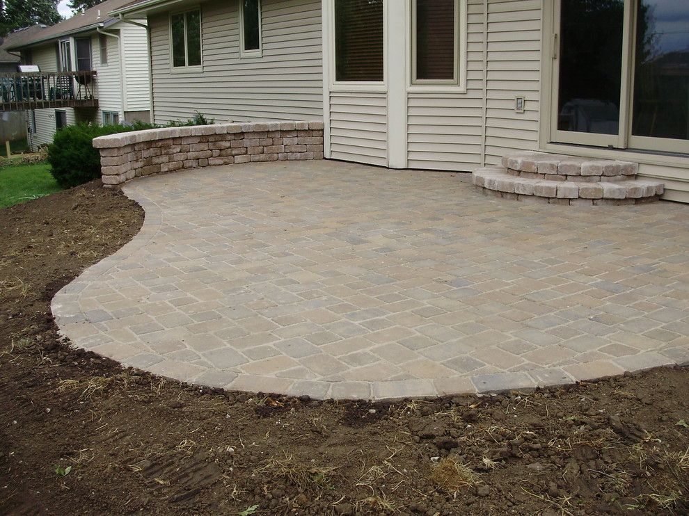 Cambridge Pavers for a  Landscape with a Patio and Cambridge Cobble Paver Patio by Topeka Landscape Inc