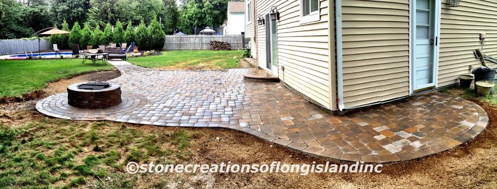 Cambridge Pavers for a Traditional Patio with a Landscape Lighting and Cambridge Paver Pool Patio with Firepit, East Northport, N.y 11731 by Stone Creations of Long Island Pavers & Masonry