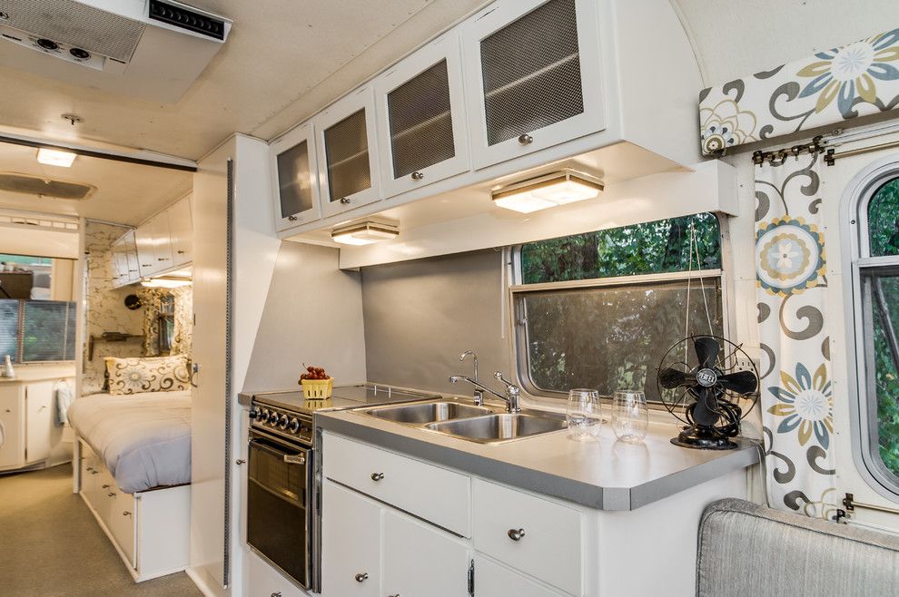 Camper Remodel for a Midcentury Kitchen with a Glamping and '72 Avion Camper Renovation by William Johnson Architect