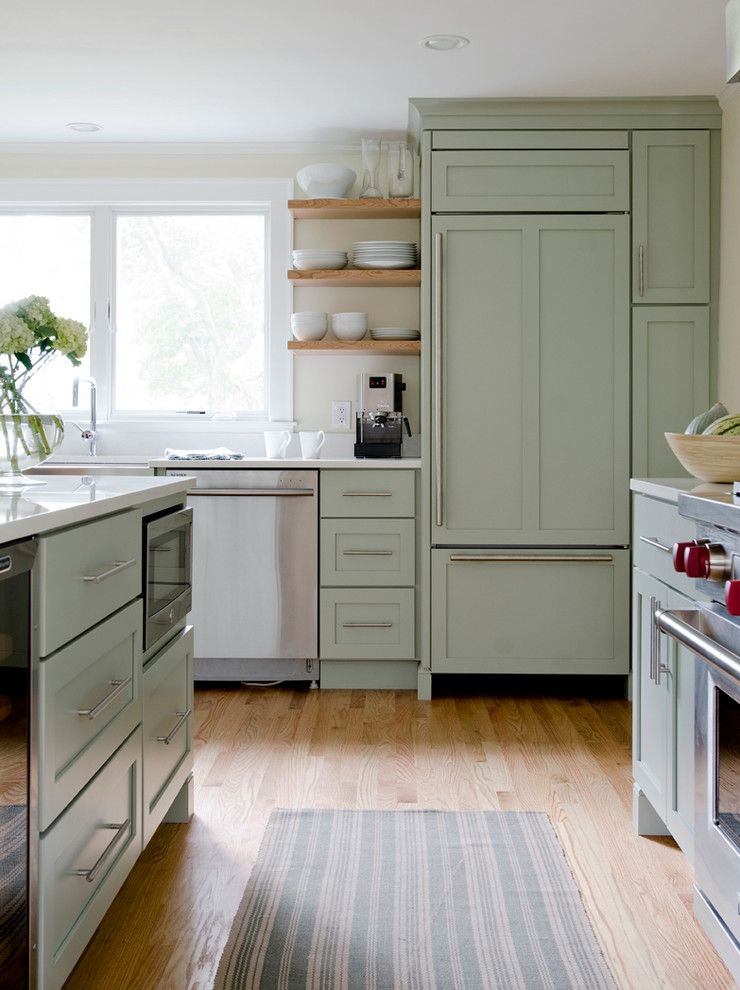 Candlelight Cabinetry for a Traditional Kitchen with a Microwave in the Island and Pond Cove by Kitchen Cove Cabinetry & Design