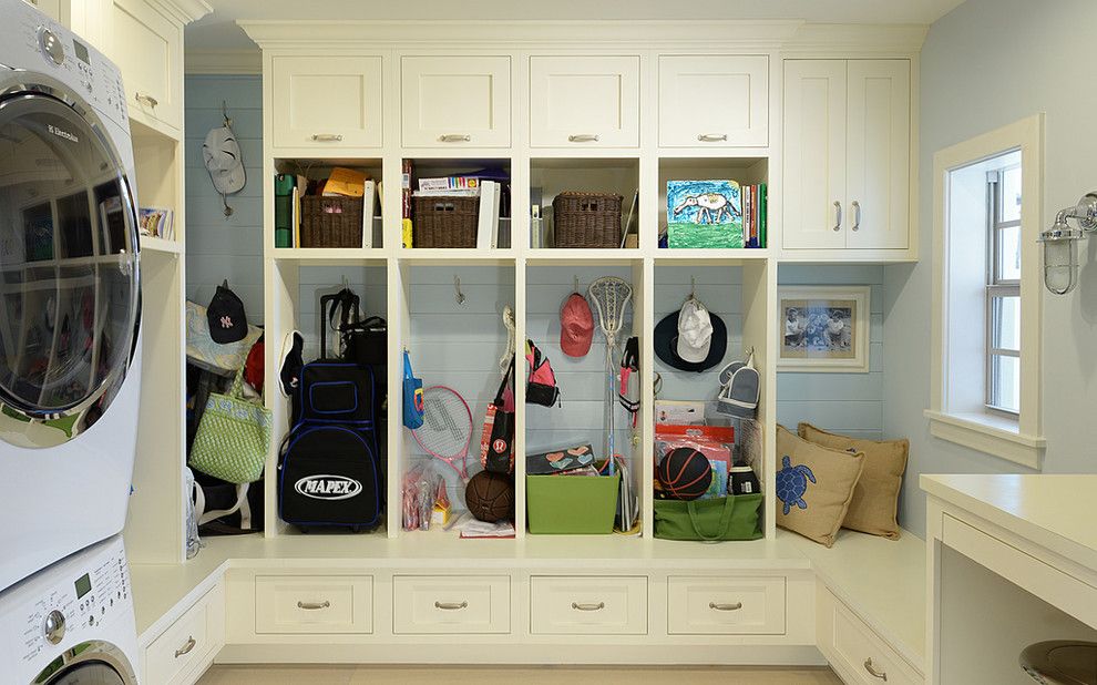 Candlelight Cabinetry for a Traditional Laundry Room with a Cubbies and Candlelight Cabinetry Portfolio by Candlelight Cabinetry, Inc