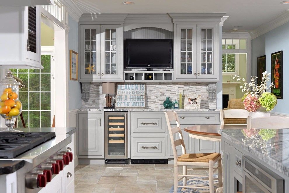 Candlelight Cabinets for a Beach Style Kitchen with a Beige Floor Tile and Candlelight Cabinetry Kitchens by Kitchen World