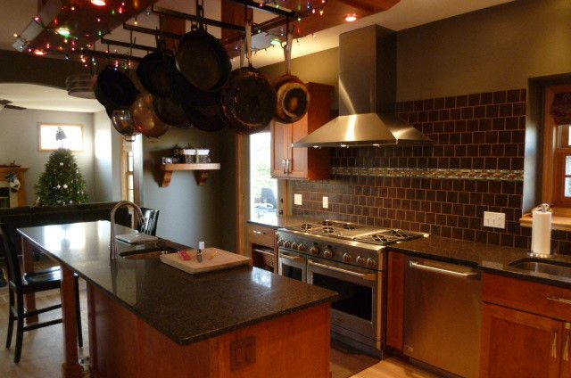 Candlelight Cabinets for a Contemporary Kitchen with a Natural Red Birch and Candlelight Cabinets by Kitchendesignstudio