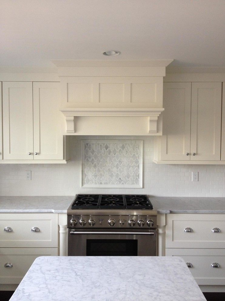 Candlelight Cabinets for a Craftsman Kitchen with a Wood Flooring and Kitchen and Fireplace by Alfano Renovations | Kitchen & Bath Showroom