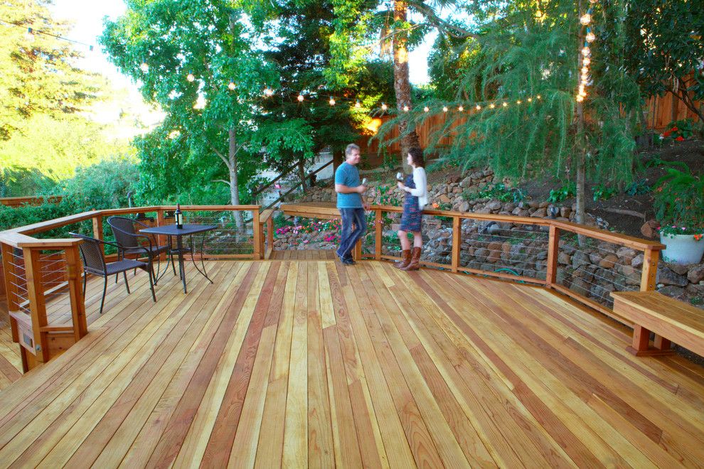 Cannon Pools for a Contemporary Deck with a Cable Railing and Wood, Naturally by Wood, Naturally