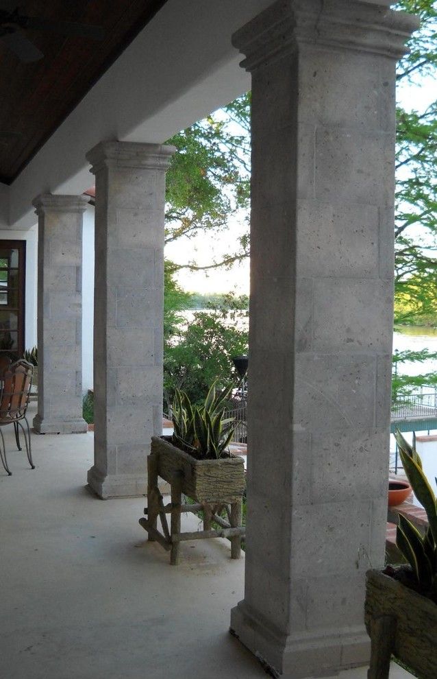 Cantera Stone for a  Porch with a Column Decor and Columns by Cantera Stone Design, Llc