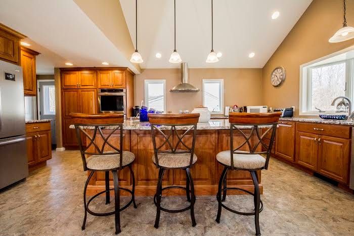 Canyon Creek Cabinets for a Traditional Kitchen with a Kitchen Island and Kitchen Remodeling by Razzano Homes and Remodelers, Inc.