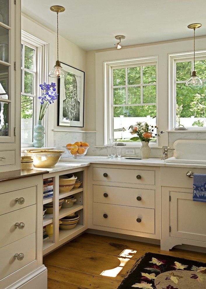 Carlisle Flooring for a Traditional Kitchen with a Farm Sink and Kitchen Transformation by Smith & Vansant Architects Pc