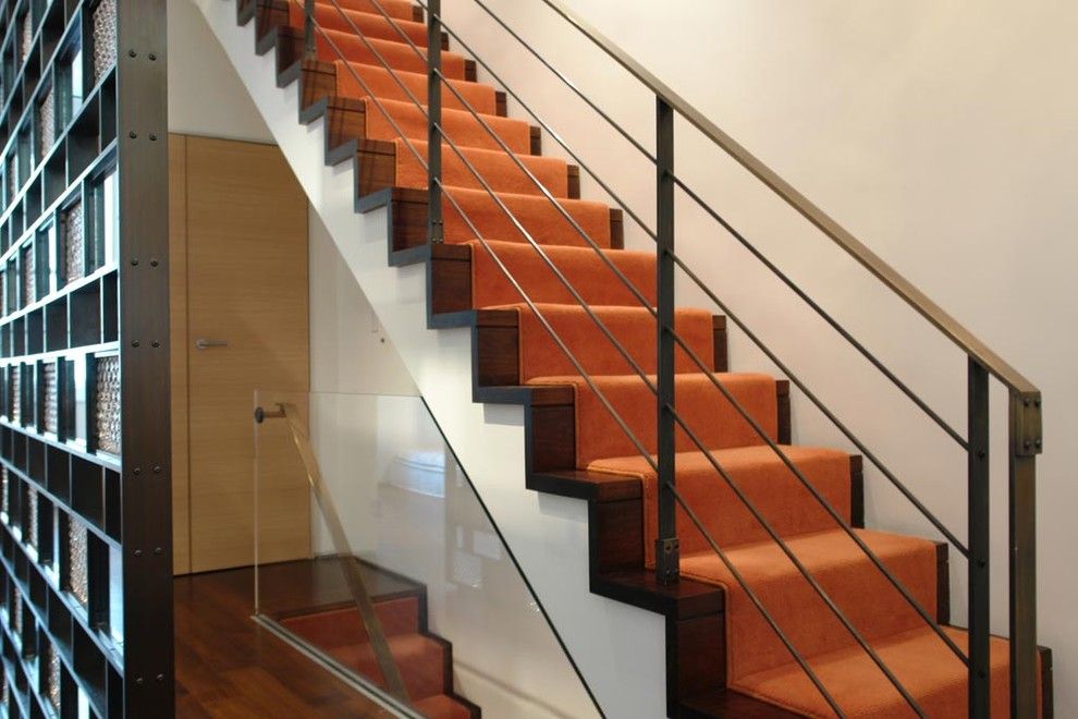 Carpeted Stairs for a Contemporary Staircase with a Walnut Floor and Greenwich Village Townhouse by Axis Mundi