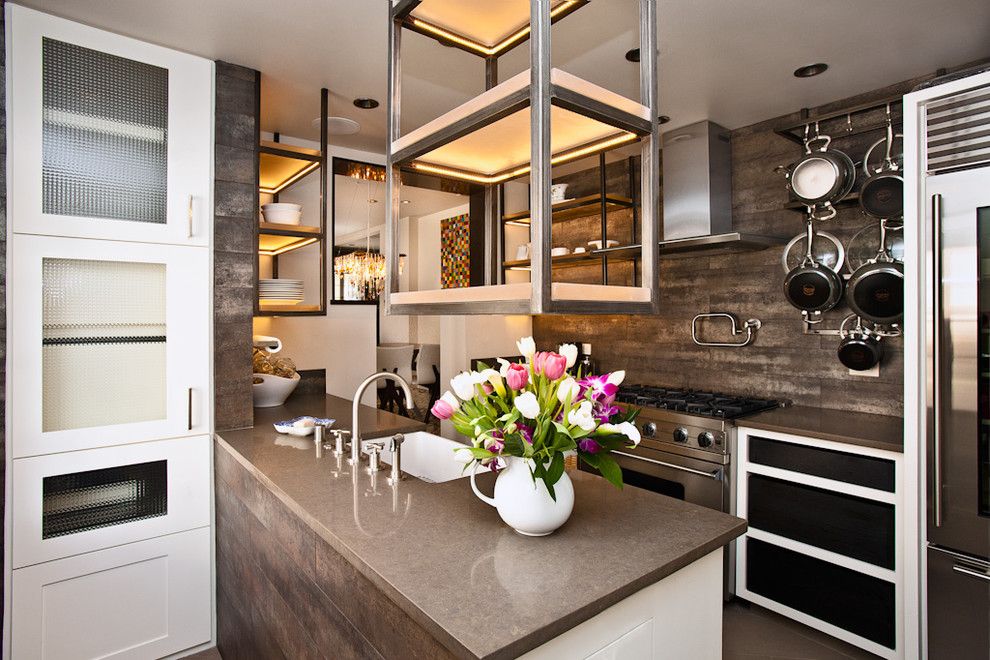 Ceaser Stone for a Contemporary Kitchen with a Hanging Pot Rack and Historic Charmer in Santa Fe by Samuel Design Group