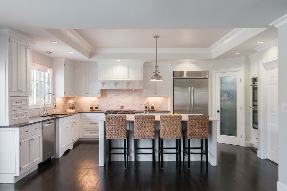 Ceaser Stone for a Transitional Kitchen with a Cove Lighting and Painted White Inset by Lazy Suzan Designs