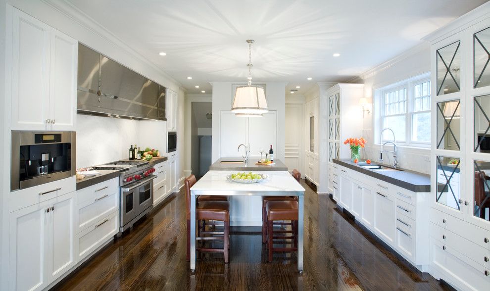 Ceaserstone for a Contemporary Kitchen with a Dark Wood Flooring and Mandeville, La by Trio Kitchen Design