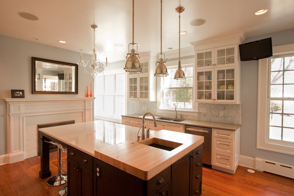 Ceaserstone for a Traditional Kitchen with a Fireplace and Transitional Glam Kitchen by Normandy Remodeling