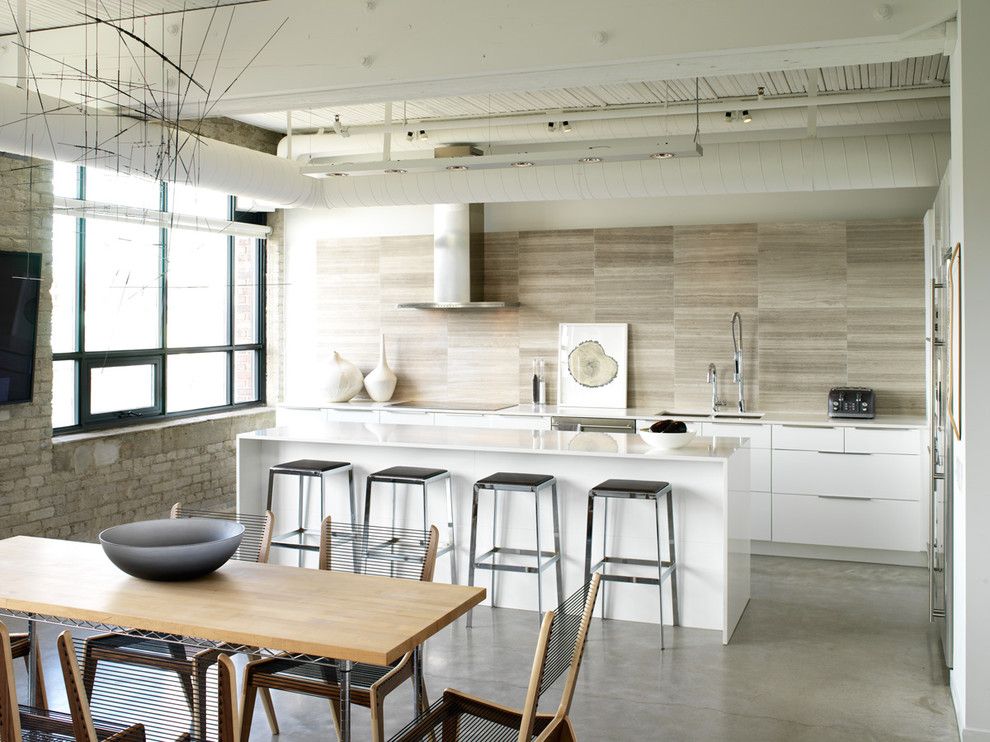 Cesar Stone for a Industrial Kitchen with a Minimal and Modern Loft Kitchen by Croma Design Inc