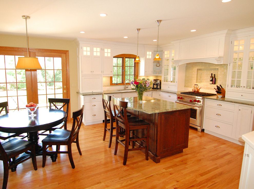 Chalk Paint Kitchen Cabinets for a Traditional Kitchen with a Wood Flooring and Showpiece Kitchen by Normandy Remodeling