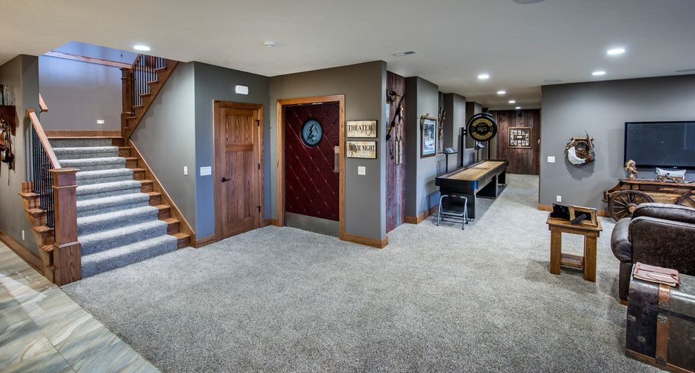 Charleston Homes Omaha for a Craftsman Basement with a Gray Stair Runner and Covered Bridge by Rezac Construction