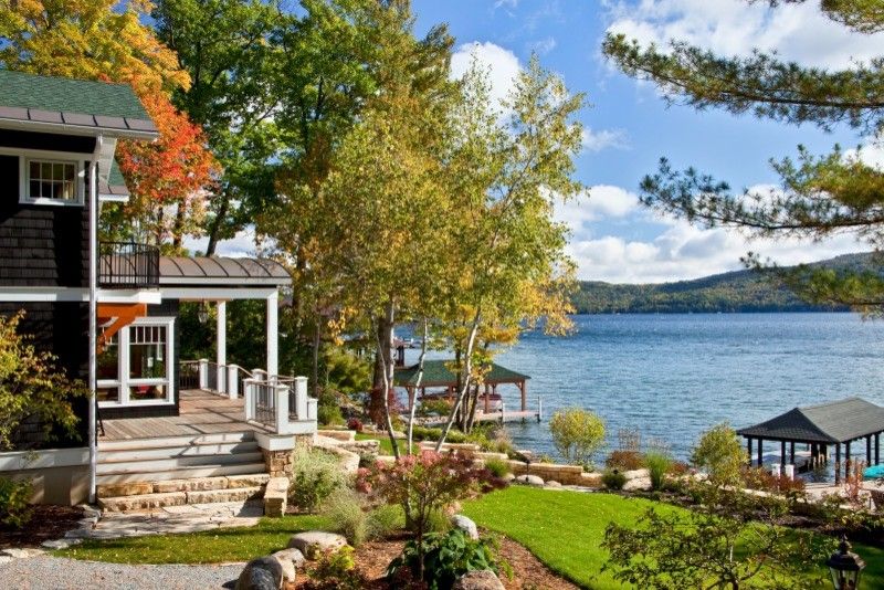 Charleston Homes Omaha for a Traditional Exterior with a Exterior Stone and Legend of the Lake by Teakwood Builders, Inc.