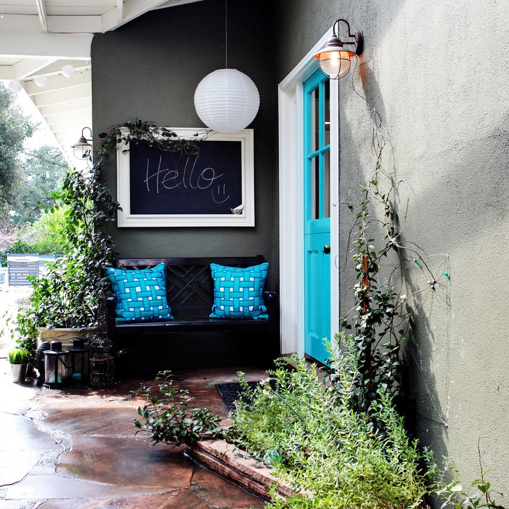 Chartreuse Color for a Eclectic Exterior with a Entry Bench and Colorful Cottage by Stephanie Wiley Photography