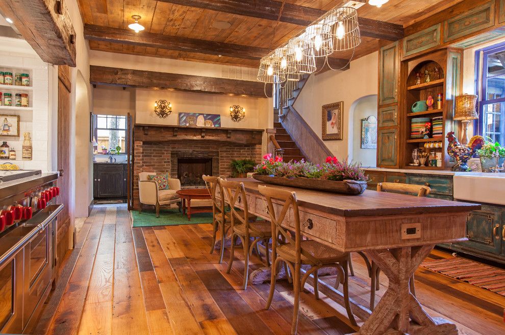 Chelsea Plank Flooring for a Farmhouse Kitchen with a Large Dining Table and Antique Barnboard Oak Flooring by Appalachian Woods