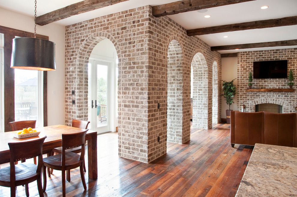 Cherokee Brick for a Traditional Living Room with a Brick Arch and Chateau De Charleston by Ink Architecture + Interiors