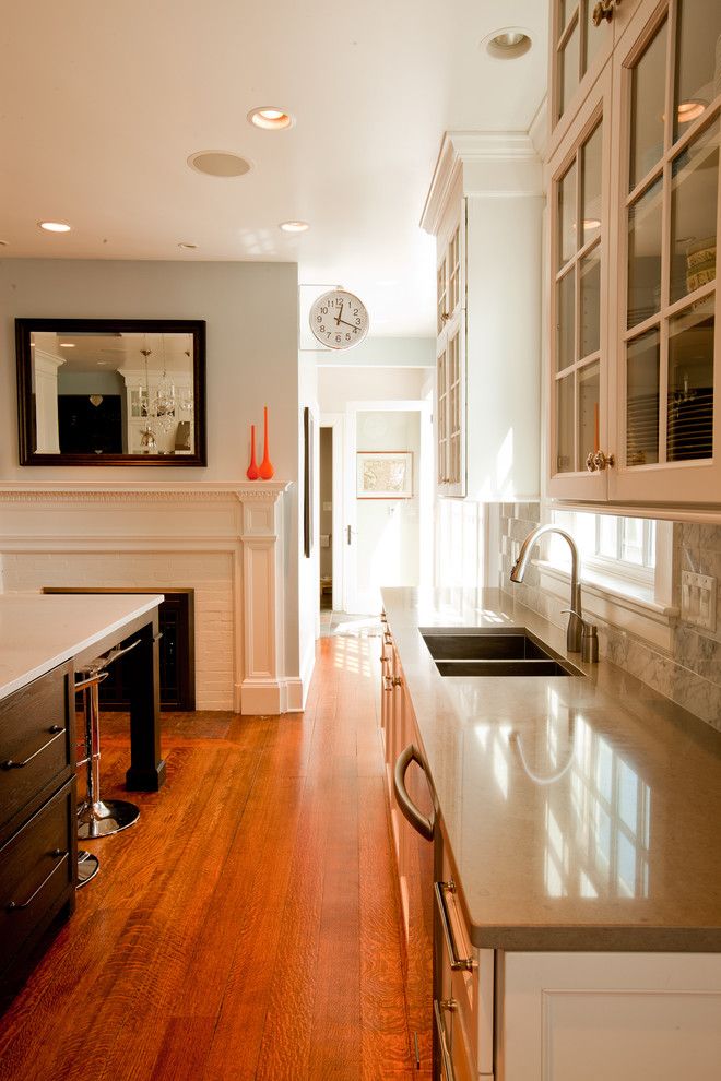 Chicago Faucet Shoppe for a Traditional Kitchen with a Fireplace and Transitional Glam Kitchen by Normandy Remodeling