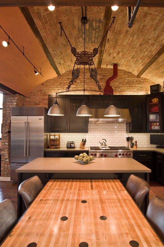 Chicago Points of Interest for a Industrial Kitchen with a Concrete Counter Top and Loft Condo Renovation by Besch Design, Ltd.