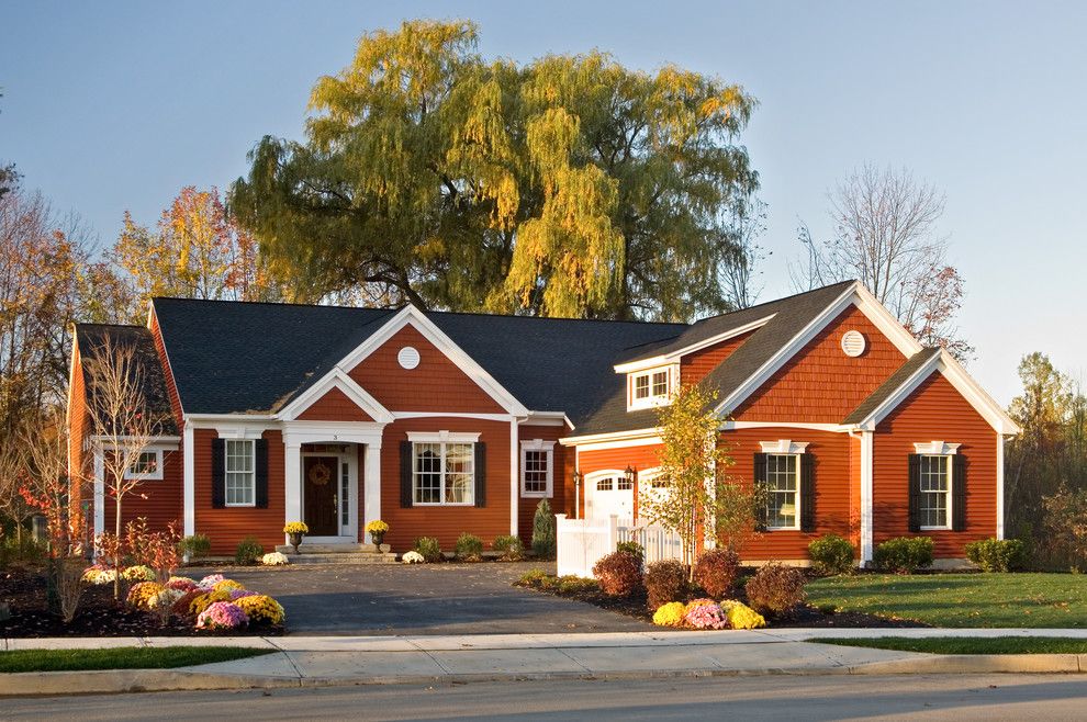 Chip N Dales for a Traditional Exterior with a New York Model Homes and 2008 Saratoga Showcase Home by Belmonte Builders